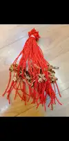 On the Dragon Boat Festival, hang peach wood bracelets with red strings to ward off evil spirits undefined